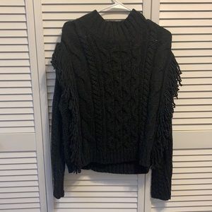 Mock turtleneck sweater with fringe detail